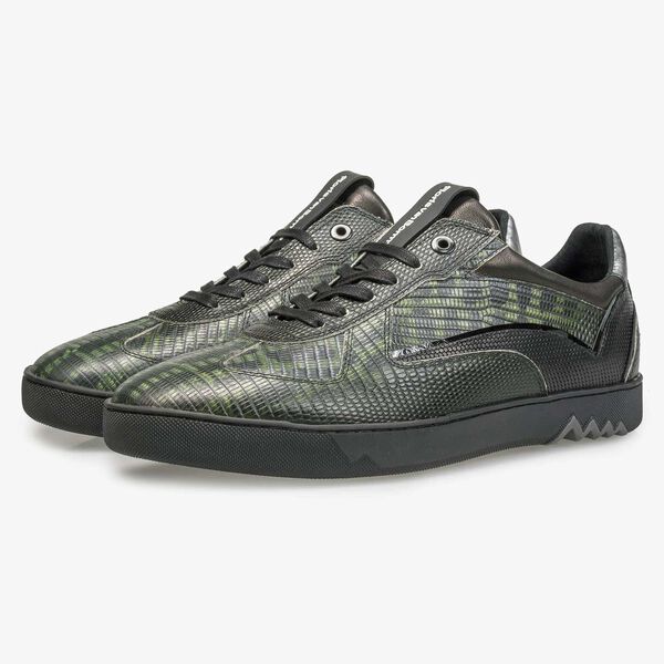 Sneaker with a lizard relief pattern
