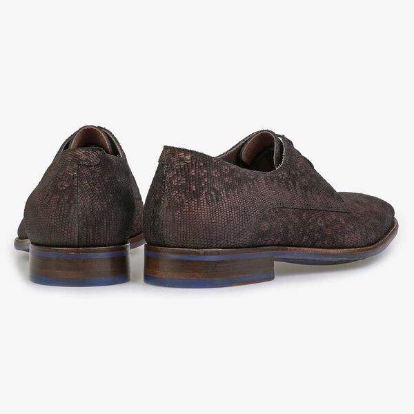 Brown lace shoe with structural pattern
