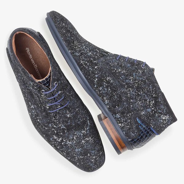 Dark blue leather lace shoe with an organic texture