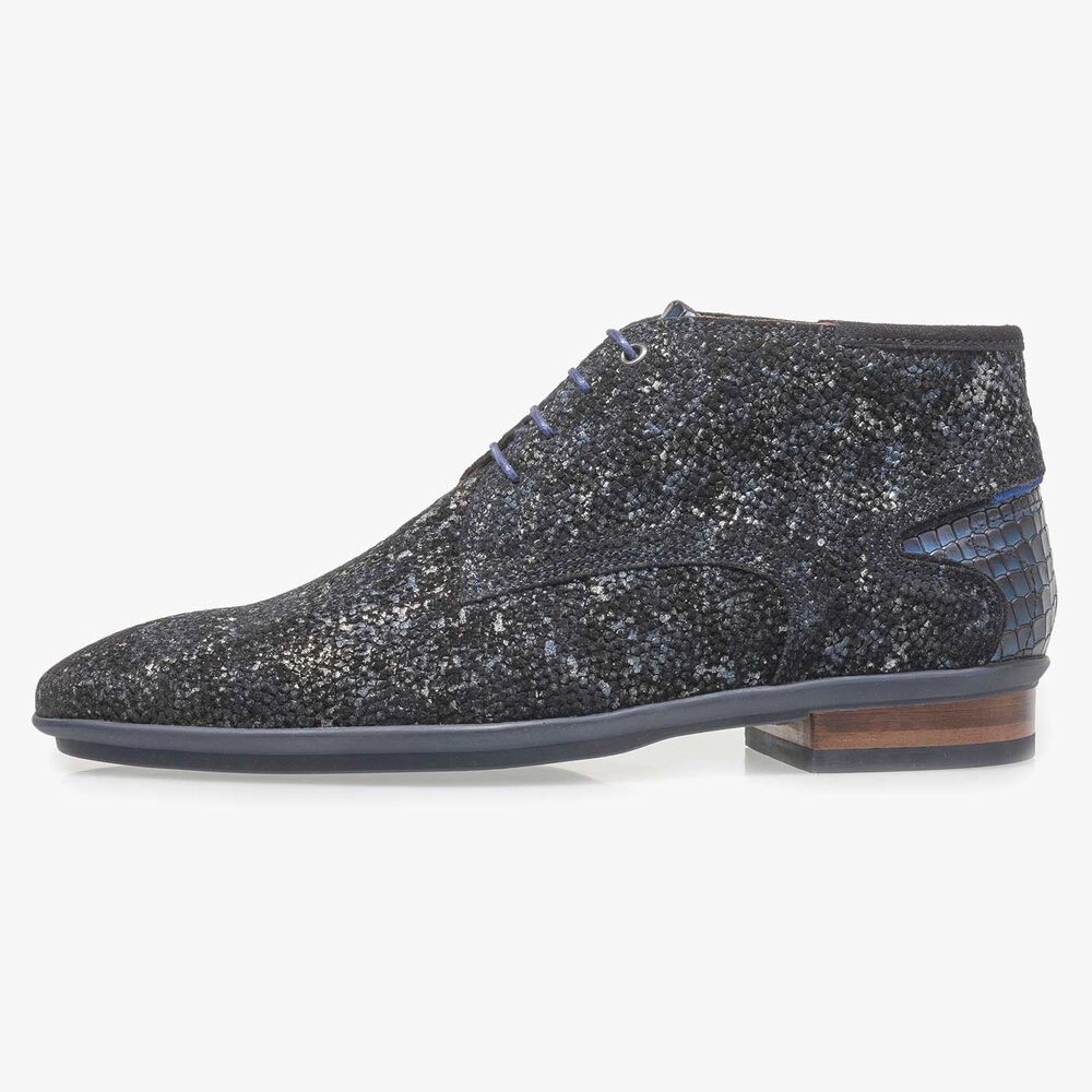 Dark blue leather lace shoe with an organic texture
