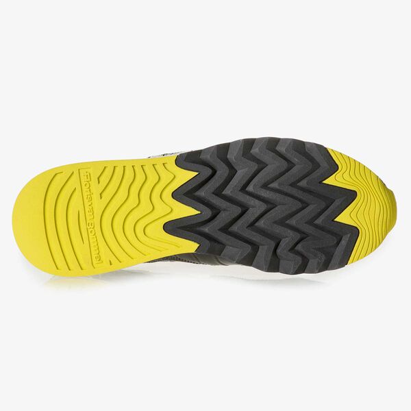 Black patent leather sneaker with yellow print