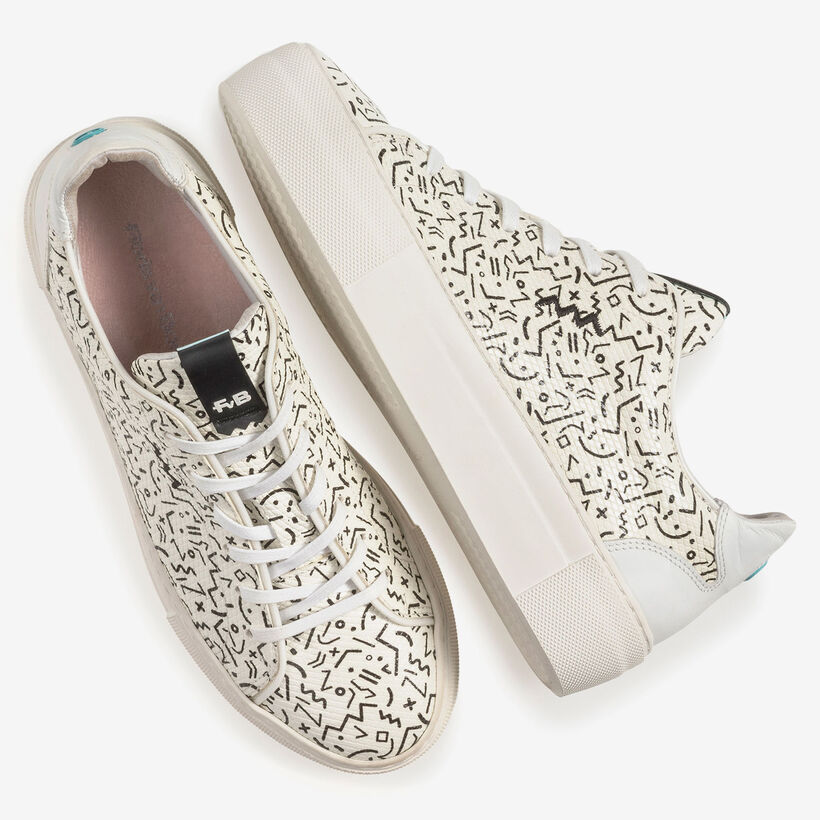 White leather sneaker with black print